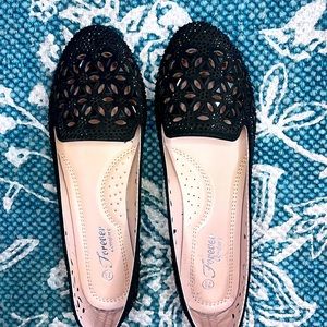 Black flats with rhinestone detail